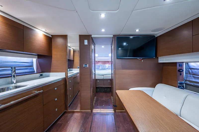  Yacht Photos Pics Luxurious interior of 2014 Sea Ray 470 Sundancer yacht with modern amenities.
