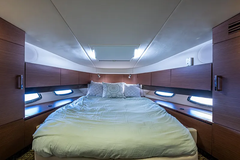  Yacht Photos Pics Luxurious bedroom interior of 2014 Sea Ray 470 Sundancer yacht.