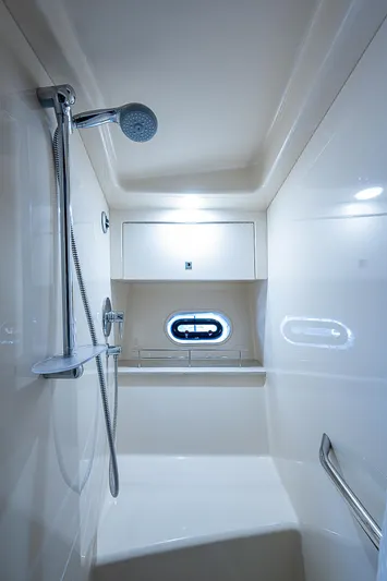  Yacht Photos Pics Luxurious bathroom in 2014 Sea Ray 470 Sundancer yacht with modern shower and sleek design.
