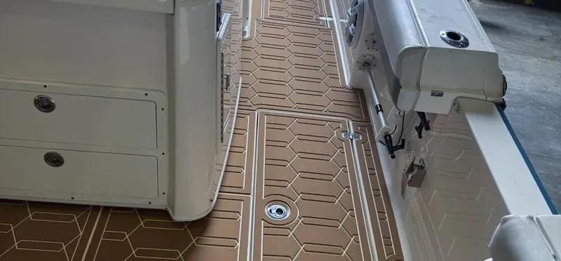  Yacht Photos Pics 2018 Cobia 344 Center Console boat interior with hexagonal patterned flooring.