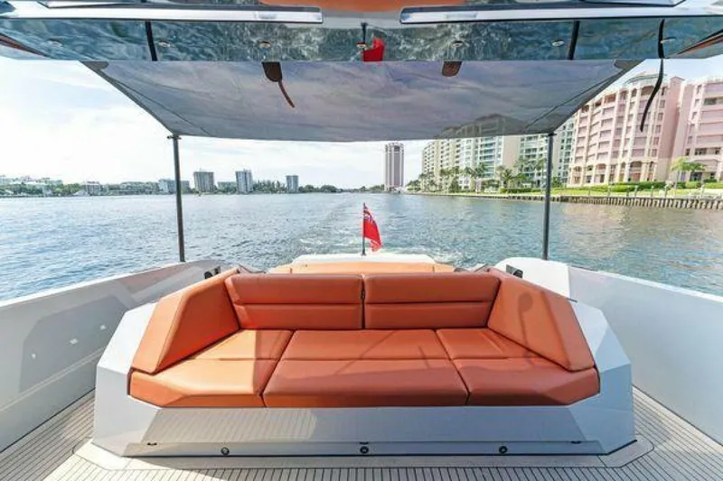 Incentivized Yacht Photos Pics Luxurious 2021 Vanquish VQ58 yacht with spacious seating and waterfront view.