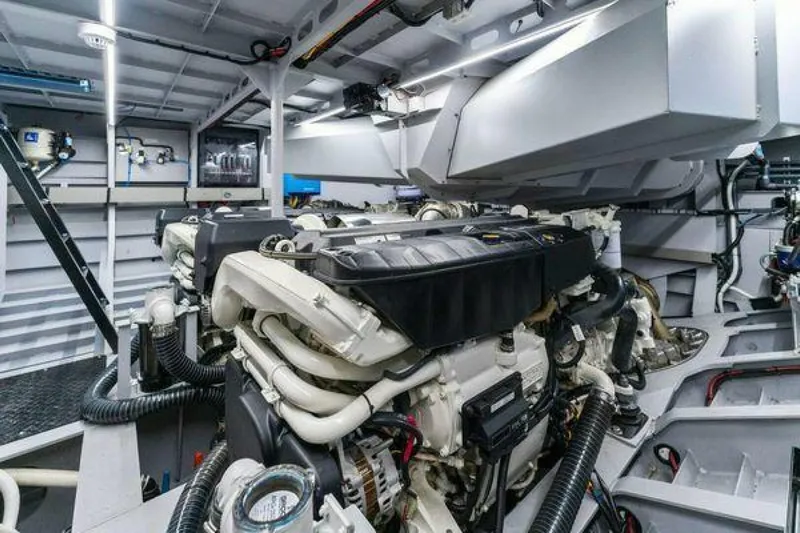 Incentivized Yacht Photos Pics Engine room of 2021 Vanquish VQ58 yacht, showcasing powerful machinery and modern design.