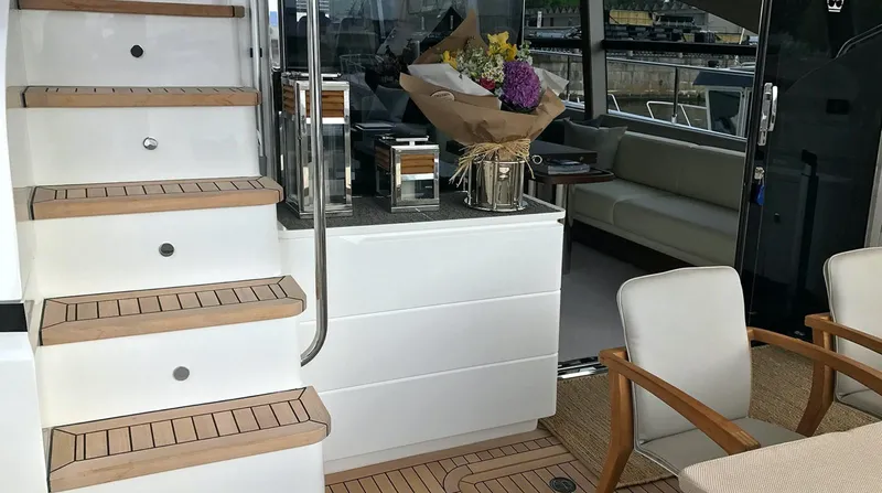  Yacht Photos Pics Luxurious 2017 Princess 68 yacht interior with elegant seating and floral arrangement.