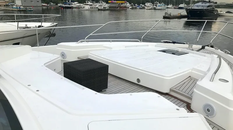  Yacht Photos Pics Princess 68 yacht deck, 2017 model, docked at marina with surrounding boats.