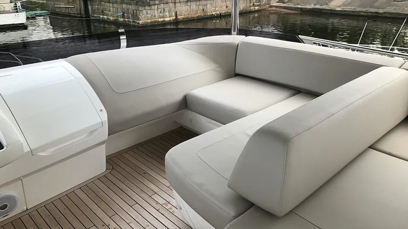  Yacht Photos Pics Luxurious seating area on 2017 Princess 68 yacht with teak flooring.