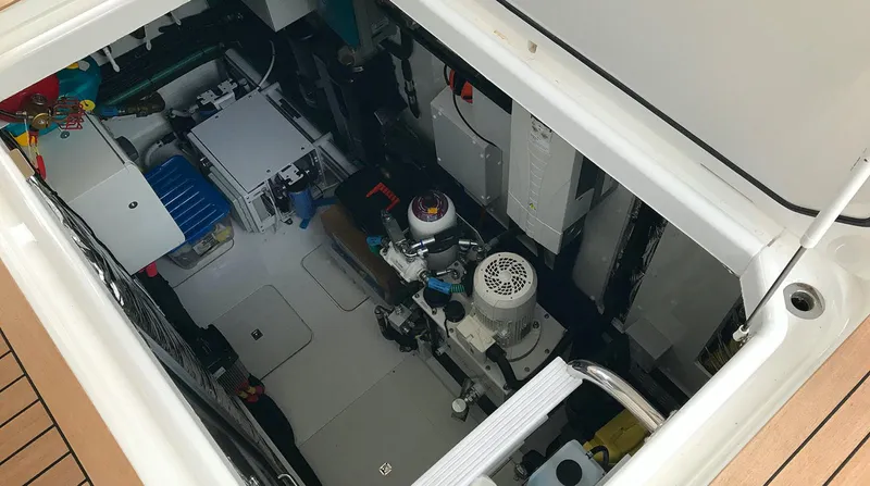  Yacht Photos Pics Engine room of 2017 Princess 68 yacht, showcasing mechanical components and equipment.