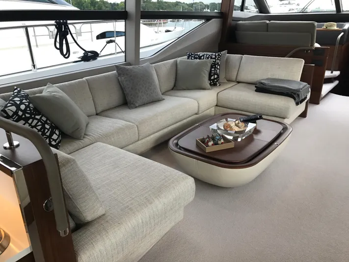  Yacht Photos Pics Luxurious 2017 Princess 68 yacht interior with elegant beige sofa and stylish decor.