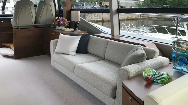  Yacht Photos Pics Luxurious interior of 2017 Princess 68 yacht with elegant sofa and decor.