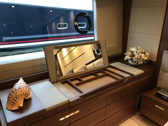  Yacht Photos Pics Luxurious interior of 2017 Princess 68 yacht with elegant wood finish and decorative elements.