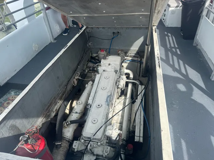 Mega Bite Yacht Photos Pics Engine compartment of a 1986 Willard Marine Shark Boat 40', designed for 30 passengers.