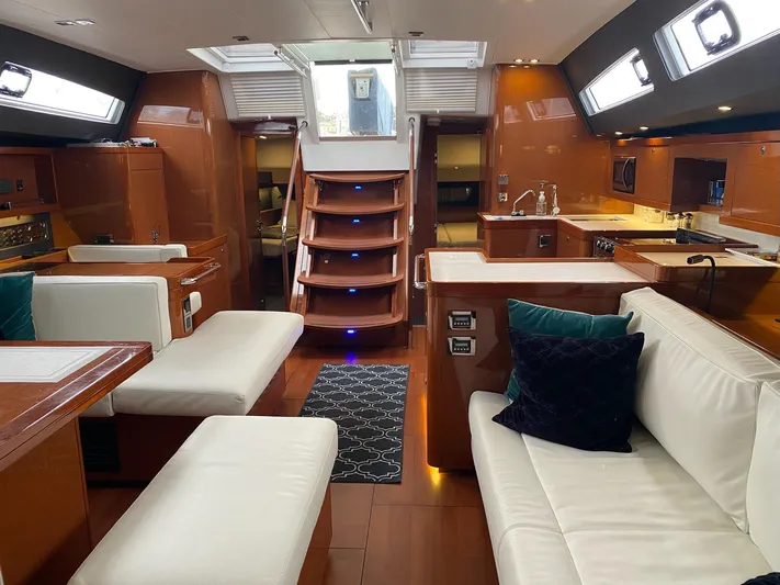 Blue Pearl Yacht Photos Pics Luxurious interior of 2016 Beneteau Oceanis 60 yacht with elegant seating and modern design.