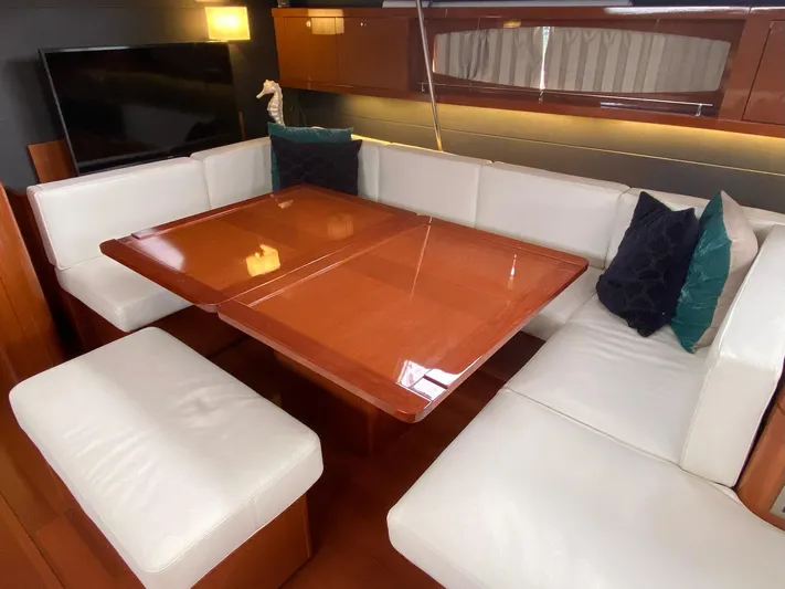 Blue Pearl Yacht Photos Pics Luxurious interior of 2016 Beneteau Oceanis 60 yacht with elegant dining area.