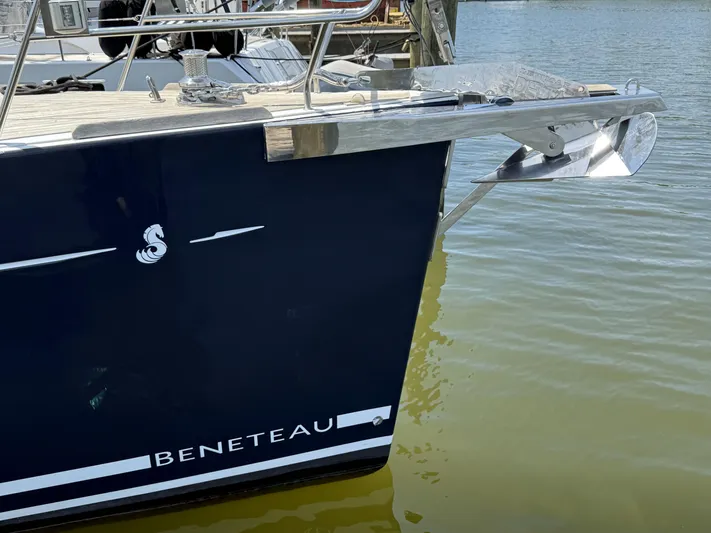 Blue Pearl Yacht Photos Pics Beneteau Oceanis 60 sailboat bow, 2016 model, anchored in calm waters.