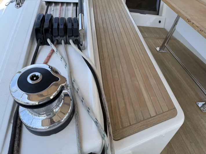 Blue Pearl Yacht Photos Pics Winch and ropes on 2016 Beneteau Oceanis 60 yacht deck.