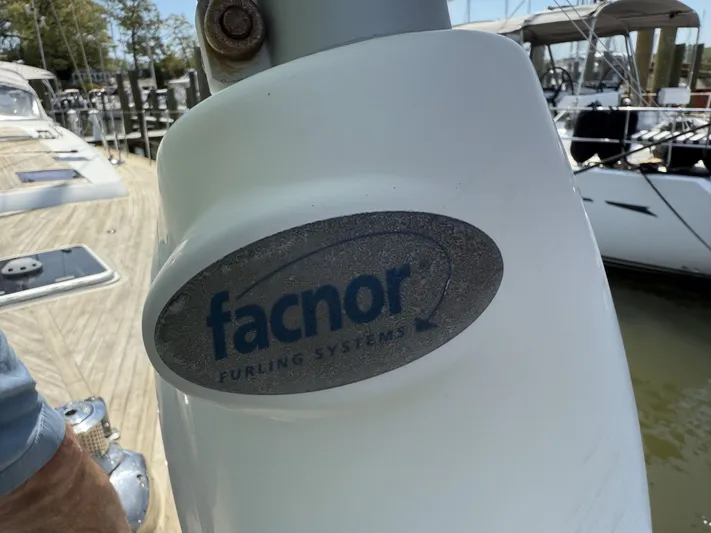 Blue Pearl Yacht Photos Pics Facnor furling system on a 2016 Beneteau Oceanis 60 sailboat at a marina.