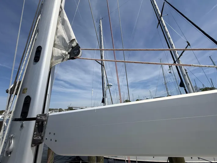 Blue Pearl Yacht Photos Pics Sailboat rigging on a 2016 Beneteau Oceanis 60 under a clear blue sky.