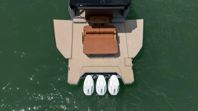  Yacht Photos Pics Aerial view of 2025 Hanover 447 boat with triple outboard motors.