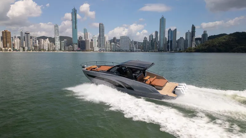  Yacht Photos Pics Luxury Hanover 447 yacht cruising near city skyline, 2025 model.