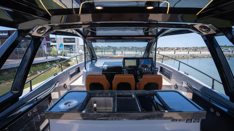  Yacht Photos Pics Luxurious interior of 2025 Hanover 447 yacht with modern navigation system and sleek design.