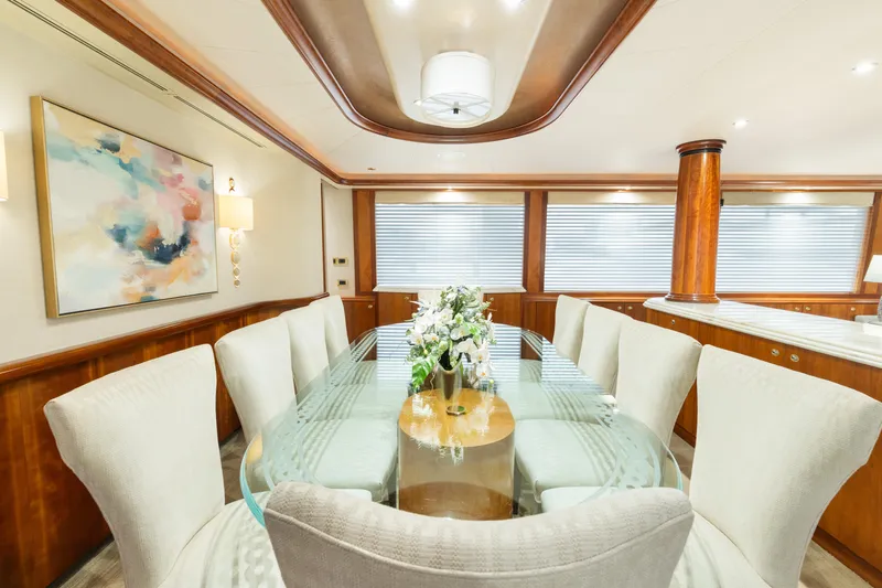 Elysian Yacht Photos Pics Luxurious dining area on 2004 Westport 130 Tri-Deck Motor Yacht with elegant decor.