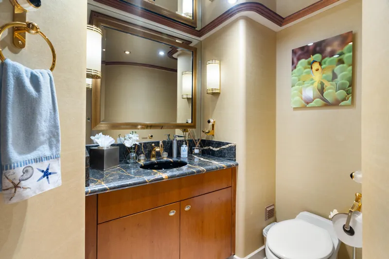 Elysian Yacht Photos Pics Luxurious bathroom on 2004 Westport 130 Tri-Deck Motor Yacht with elegant fixtures and decor.