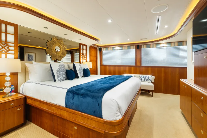 Elysian Yacht Photos Pics Luxurious bedroom interior of 2004 Westport 130 Tri-Deck Motor Yacht with elegant decor.