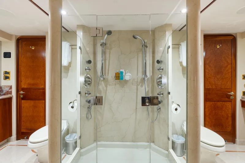 Elysian Yacht Photos Pics Luxurious bathroom on 2004 Westport 130 Tri-Deck Motor Yacht with dual showerheads.