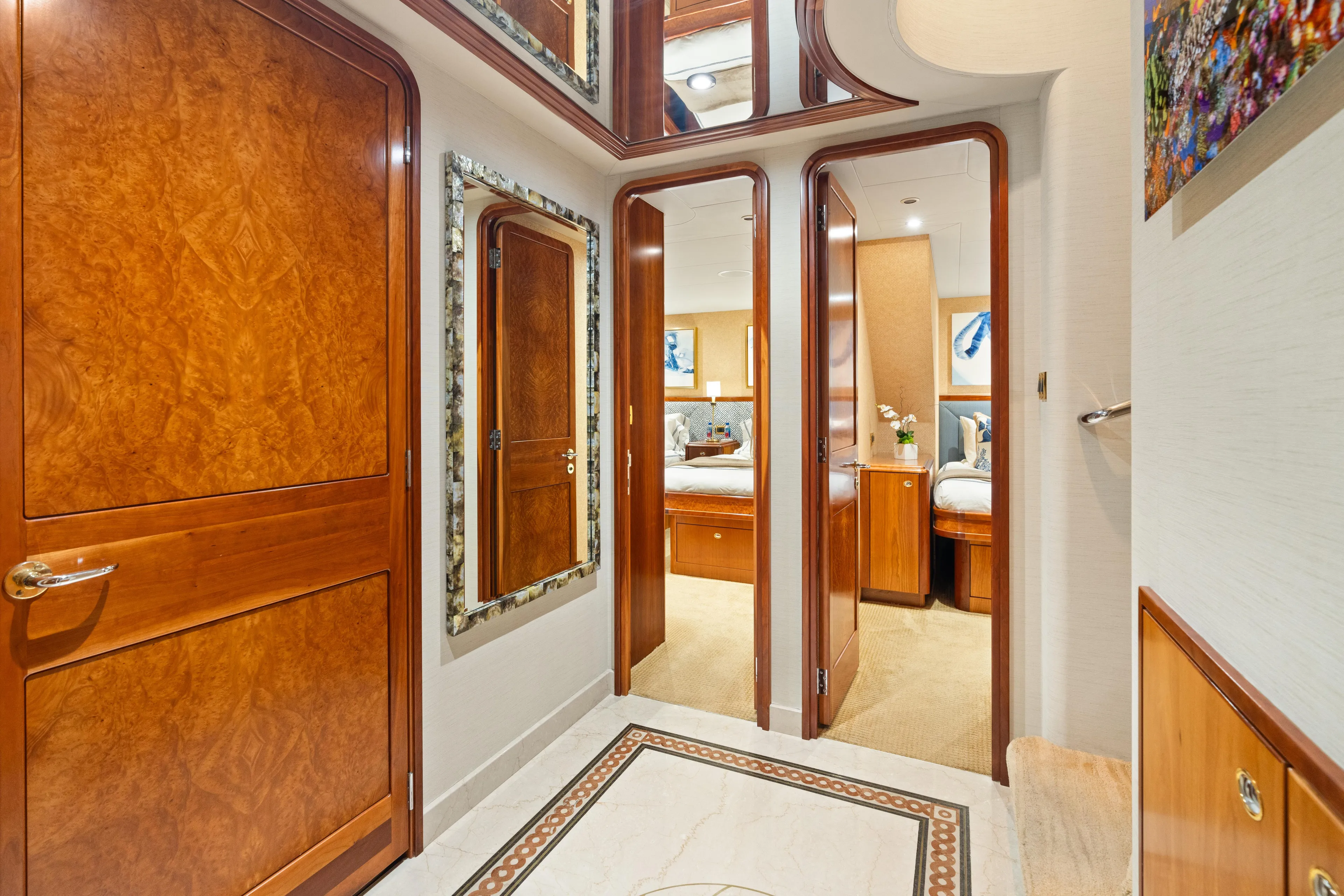 Elysian Yacht Photos Pics Luxurious interior of 2004 Westport 130 Tri-Deck Motor Yacht with elegant wood finishes.