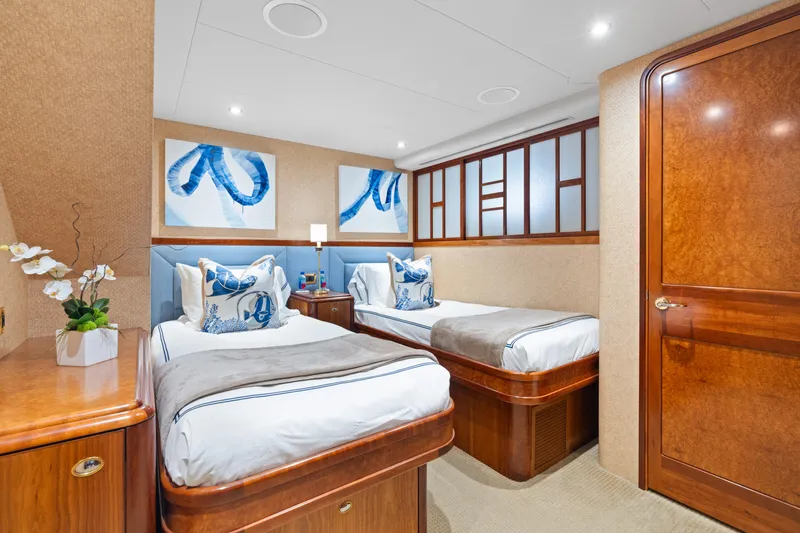 Elysian Yacht Photos Pics Luxurious twin bedroom on 2004 Westport 130 Tri-Deck Motor Yacht, featuring elegant decor.