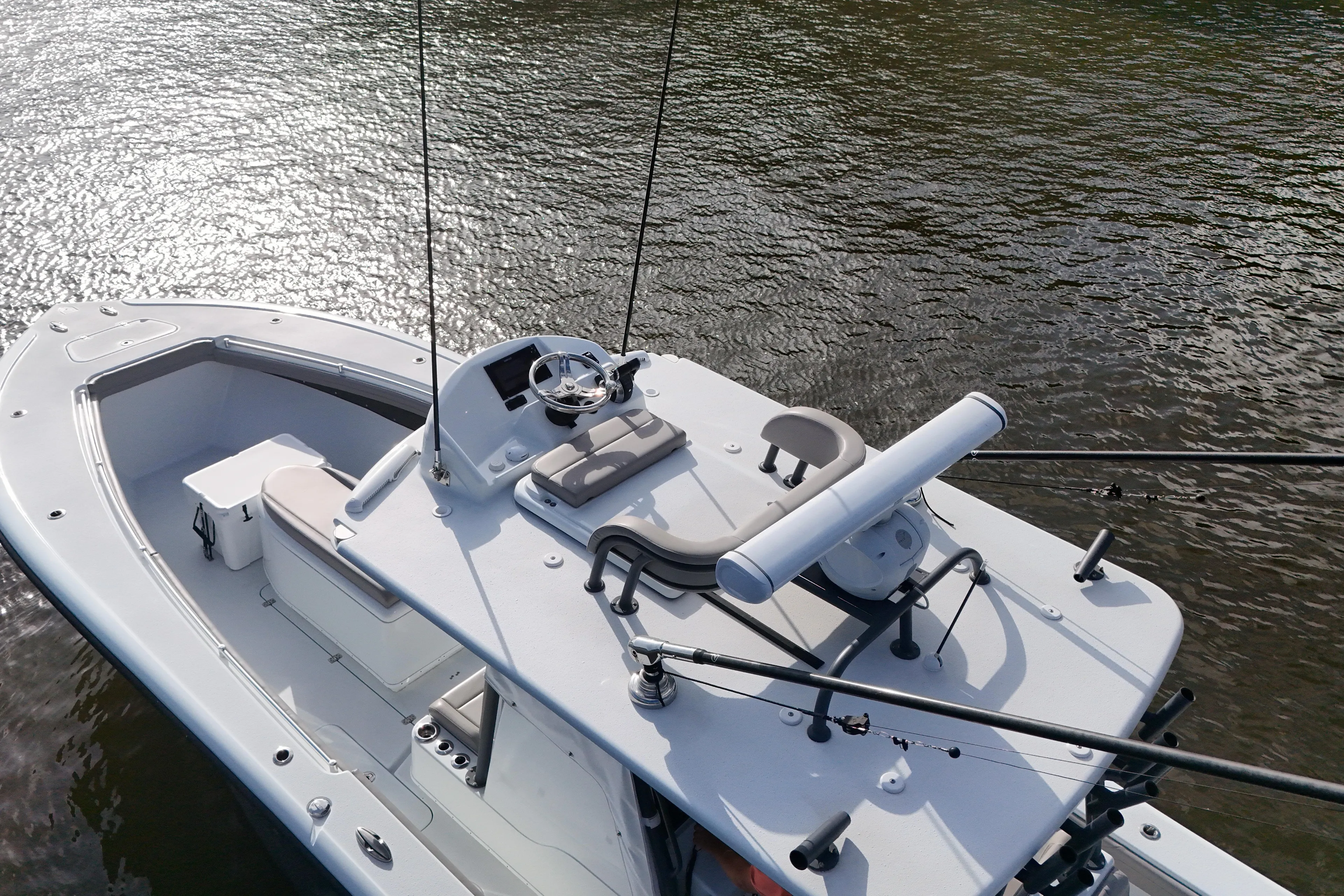 Warranty X Trailer Yacht Photos Pics 2022 Yellowfin 34 Offshore boat on water, featuring sleek design and modern controls.