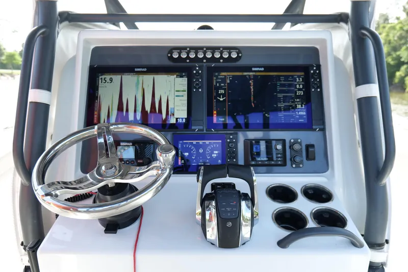 Warranty X Trailer Yacht Photos Pics Control panel of 2022 Yellowfin 34 Offshore boat with advanced navigation displays.