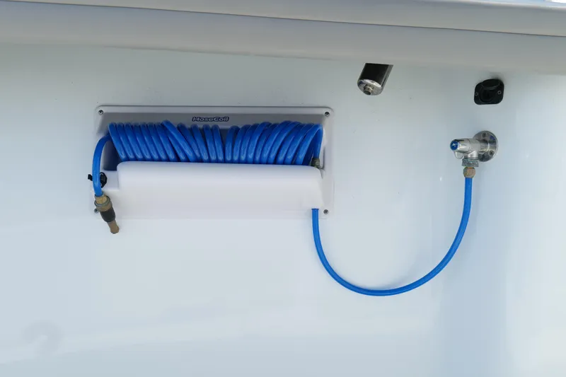 Warranty X Trailer Yacht Photos Pics Blue coiled hose on 2022 Yellowfin 34 Offshore boat.