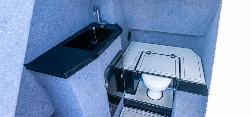  Yacht Photos Pics Compact bathroom in 2025 Novielli Veloche 349 with sink and toilet.