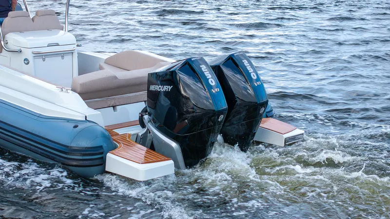  Yacht Photos Pics 2024 SACS Strider 900 with dual Mercury outboard engines on water.