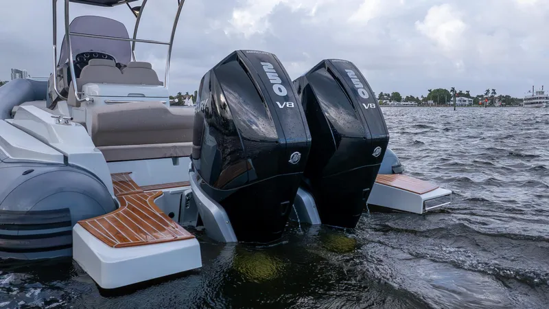  Yacht Photos Pics 2024 SACS Strider 900 with dual outboard engines on water.