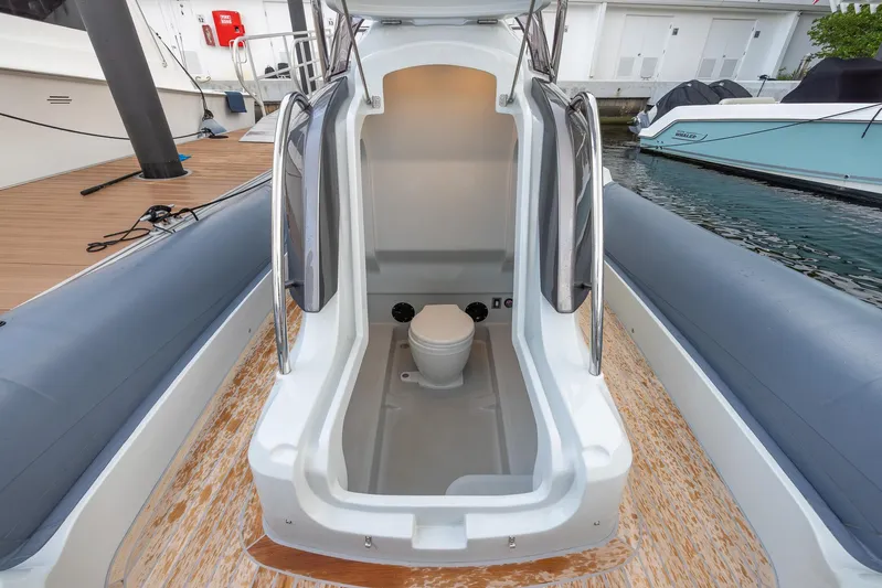  Yacht Photos Pics 2024 SACS Strider 900 boat interior with modern toilet compartment.