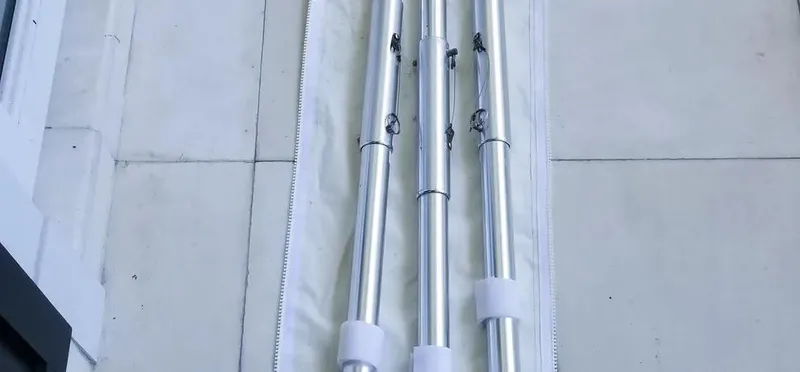  Yacht Photos Pics Three silver poles on a white surface, part of a 2016 Intrepid 327 Center Console.