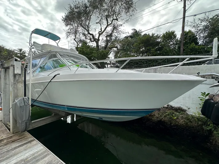 Maripal Yacht Photos Pics 2008 Contender 38 Express boat docked, featuring sleek design and white hull.