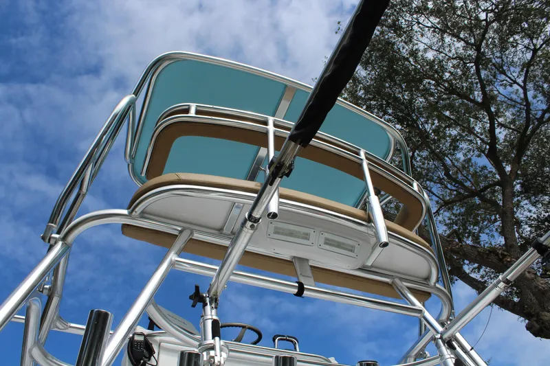 Maripal Yacht Photos Pics 2008 Contender 38 Express boat tower against blue sky and tree backdrop.