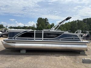 2025 Godfrey Monaco 235 DFL pontoon boat on display outdoors.