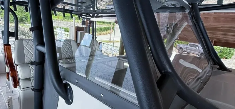  Yacht Photos Pics 2019 Freeman 42 LR boat interior with cushioned seating and sleek design.