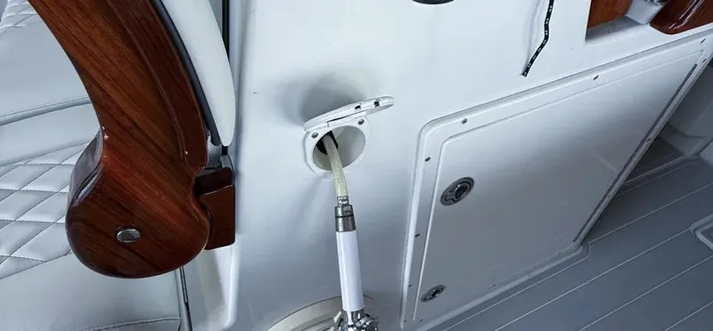  Yacht Photos Pics Freeman 42 LR 2019 boat interior with hose and wooden trim detail.
