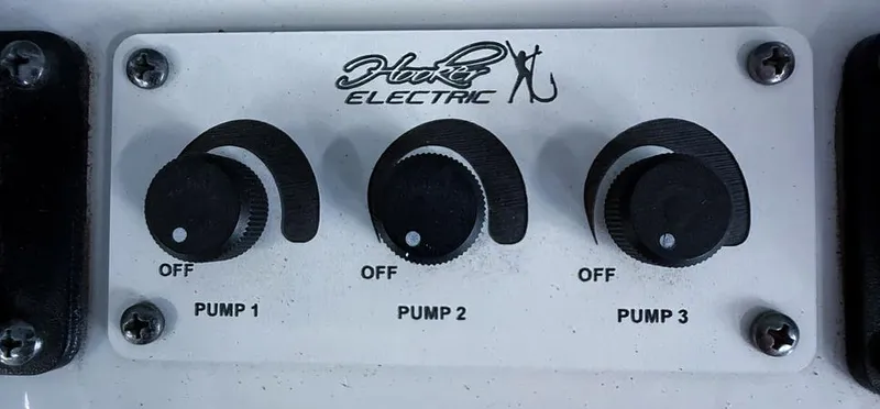  Yacht Photos Pics Hooker Electric pump controls on Freeman 42 LR, 2019 model, featuring three adjustable knobs.