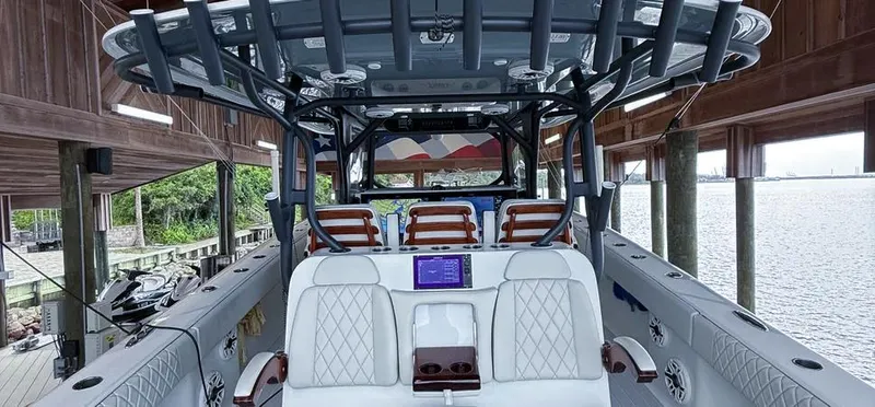  Yacht Photos Pics 2019 Freeman 42 LR boat interior with luxurious seating and advanced navigation system.