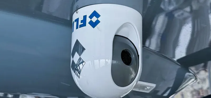  Yacht Photos Pics Close-up of a Freeman 42 LR 2019 camera with reflective surface.
