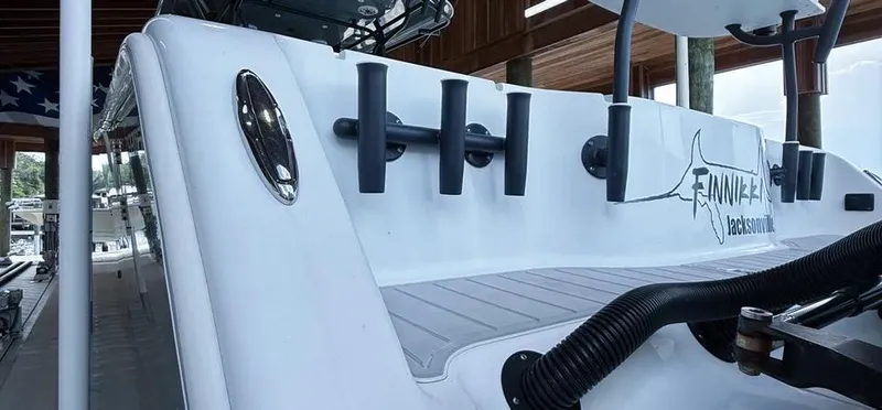  Yacht Photos Pics 2019 Freeman 42 LR boat docked, featuring rod holders and sleek design.