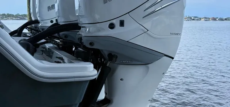  Yacht Photos Pics Freeman 42 LR 2019 boat engines on water, showcasing powerful outboard motors.