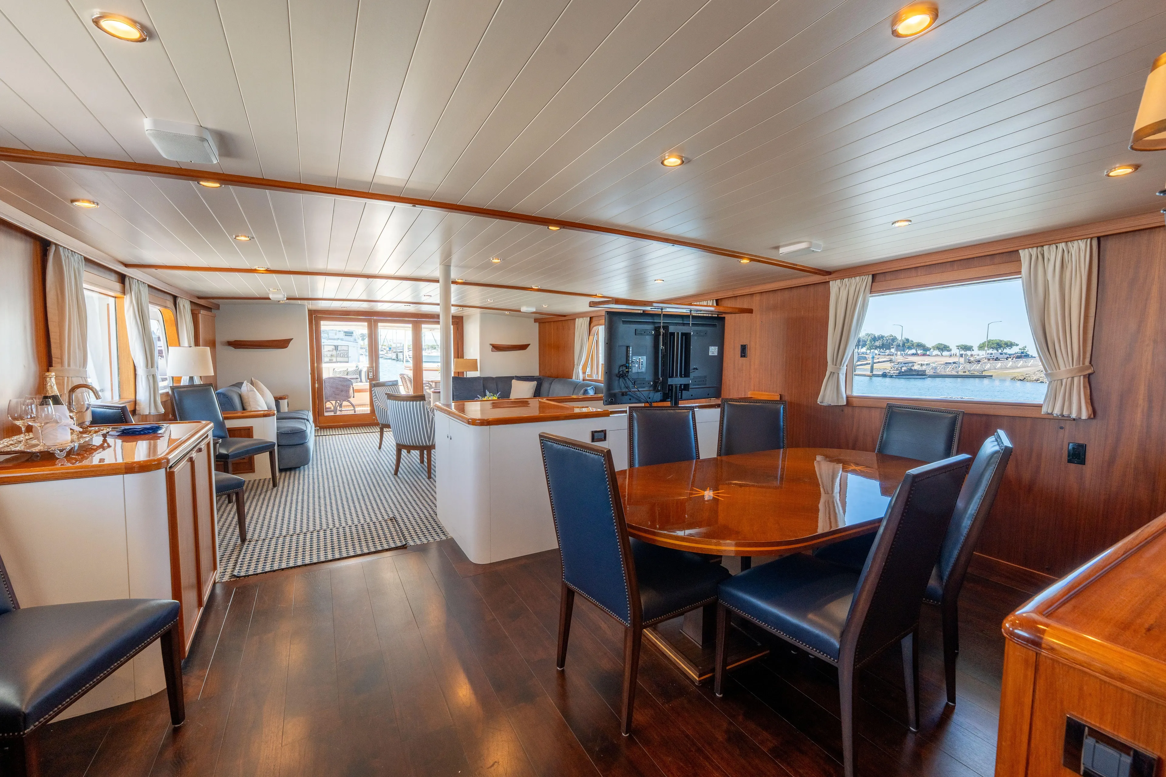 Luxurious 1969 Lantana Custom yacht interior with elegant wood finishes and spacious seating.