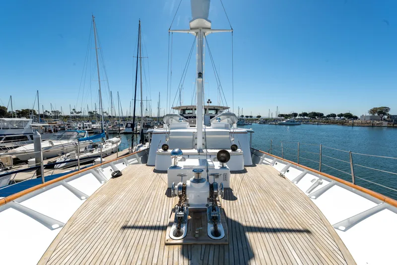 Nordic Star Yacht Photos Pics 1969 Lantana Custom yacht deck in marina, clear blue sky, surrounded by boats.