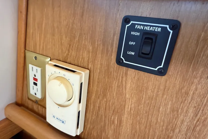 Touchdown Yacht Photos Pics Control panel on 2000 Bayliner 3988 Command Bridge Motoryacht with fan heater and thermostat.